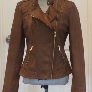 Brown biker faux leather jacket.